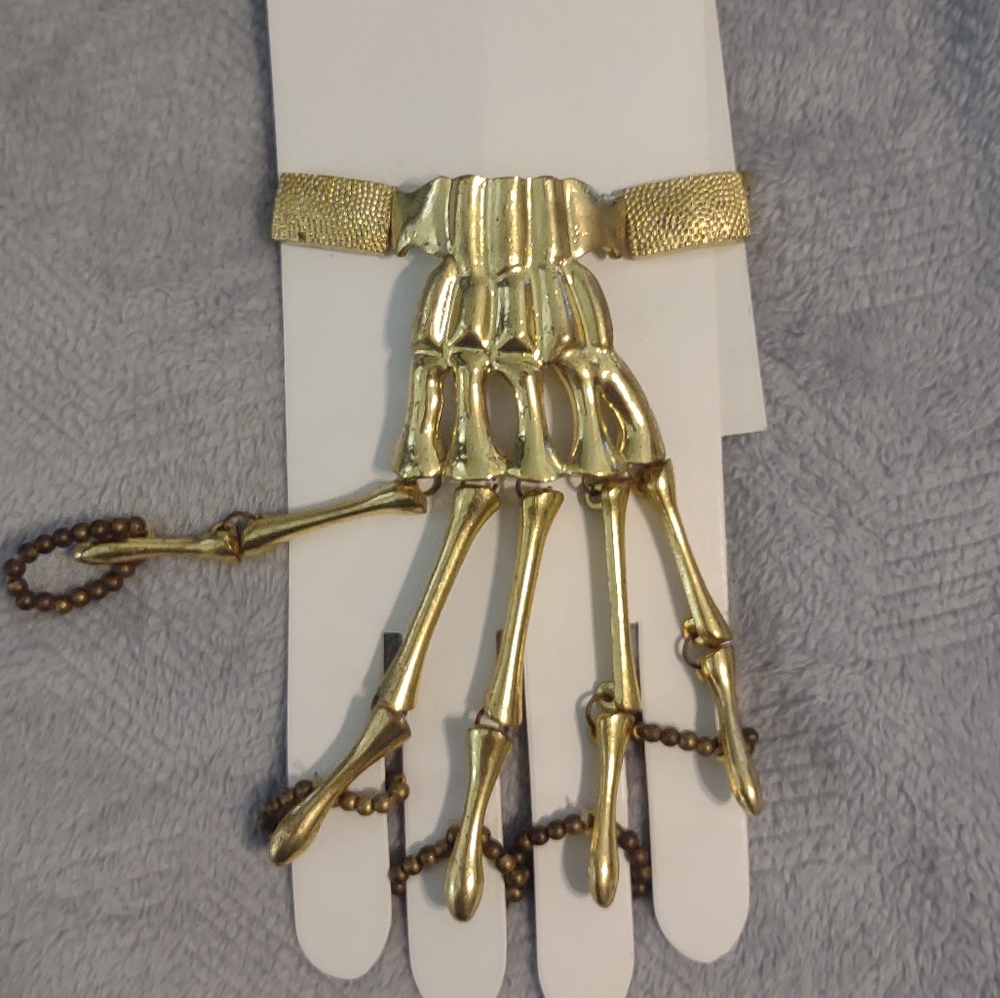 gold tone skeleton hand bracelet bony finger slave ring